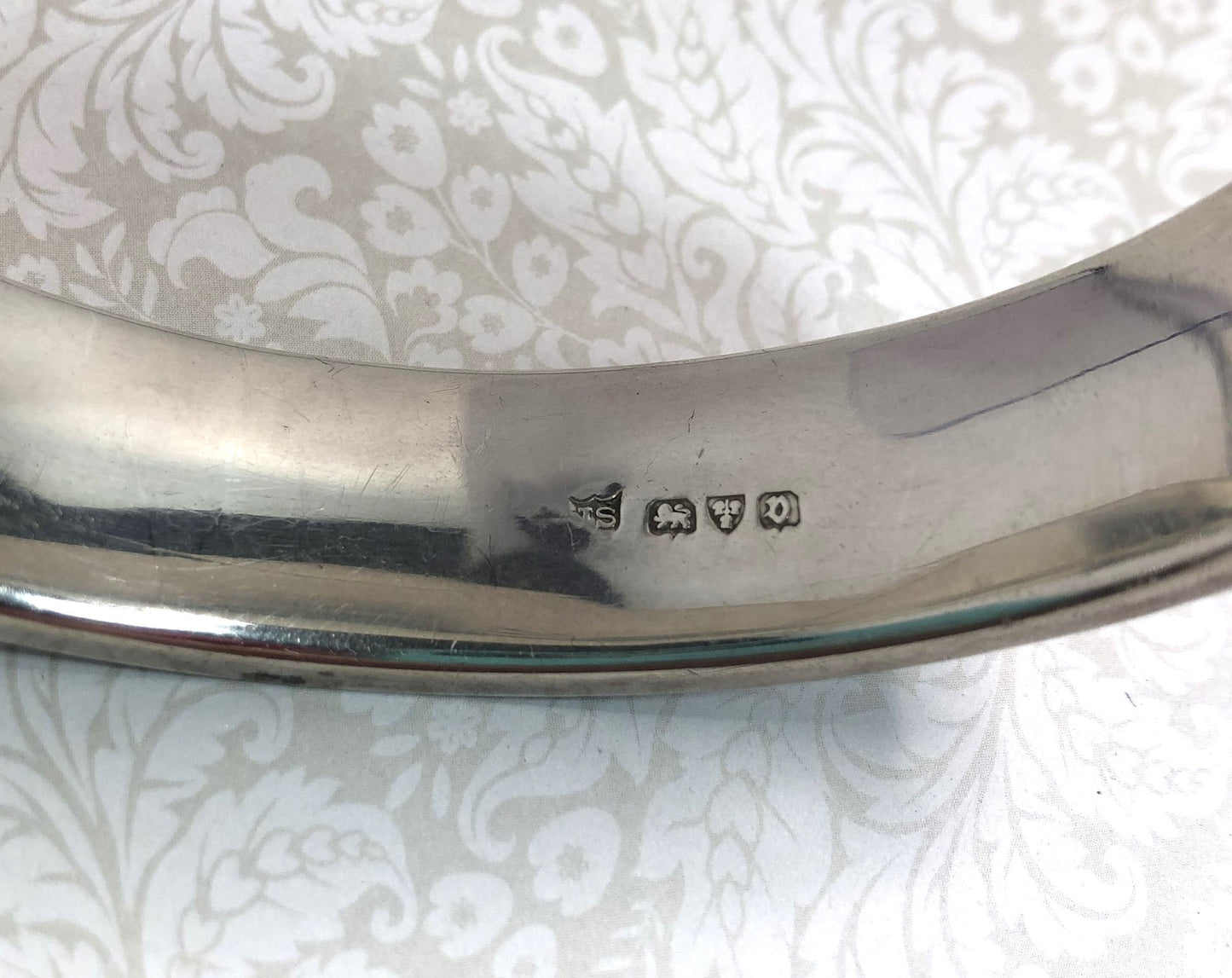 Silver Victorian hinged bangle with hand engraved scroll work, Chester hallmark.